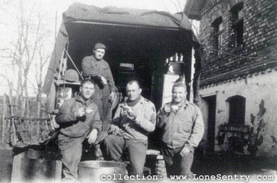 [42nd Tank Battalion, 11th Armored Division: GIs with Truck]