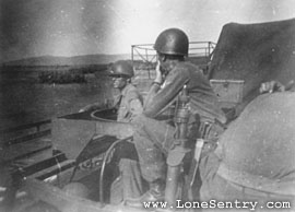 [3rd Armored Division Men and Halftracks at Regimental Parade]