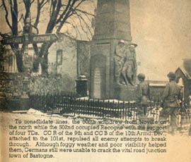 [101st Airborne Division: Soldiers pause at WWI monument]